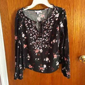 Candie's black blouse with floral design